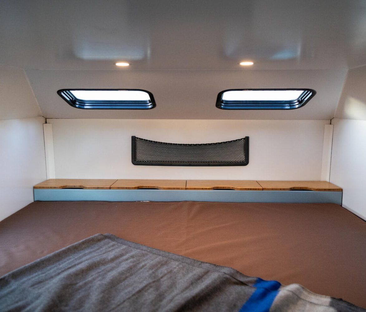 alaskan-hs-640-composite-pickup-camper-14-queen-bed-interior-1174x1000.jpg | Image